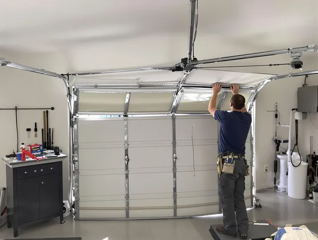 Bell Gardens Garage Door Repair specialist performing precise section replacement on Bell Gardens garage door